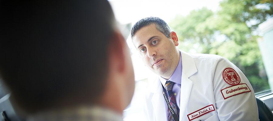 Dr. Adam Ehrlich talking with IBD patient