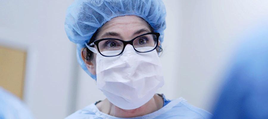 Closeup of Dr. Lisa Rae wearing a face mask