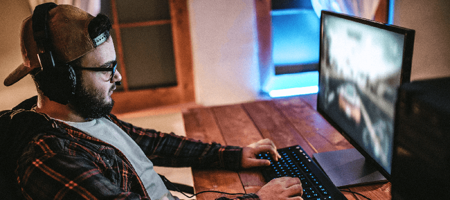 Man playing video games on the computer