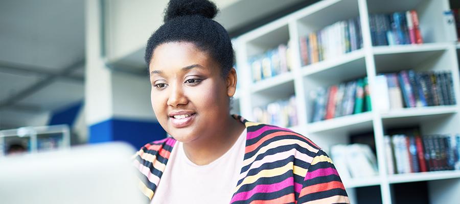 Woman reading on the computer