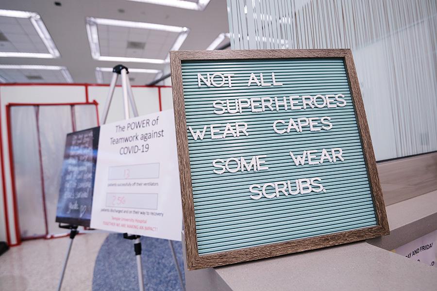 Sign that reads, Not all superheroes wear capes. Some wear scrubs.
