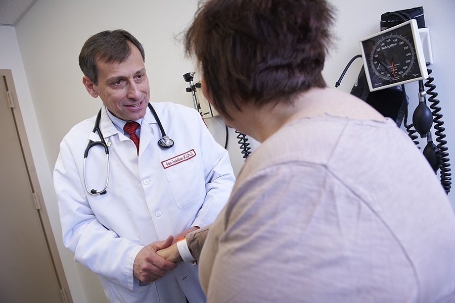 Dr. Constantinescu with a patient