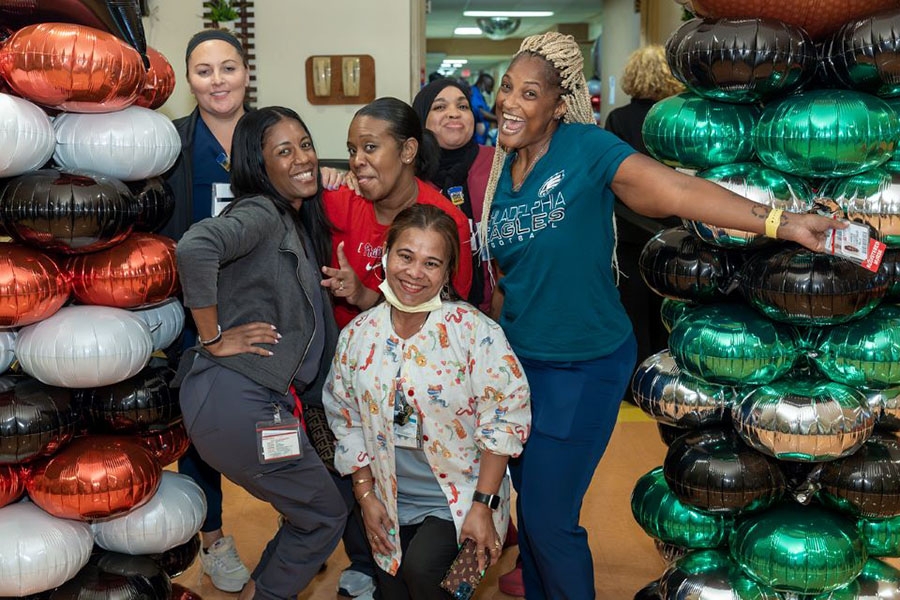 Employees at Chestnut Hill Hospital block party