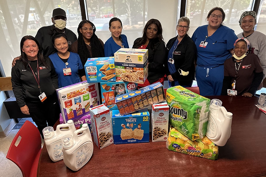 Temple Health employees with donated items
