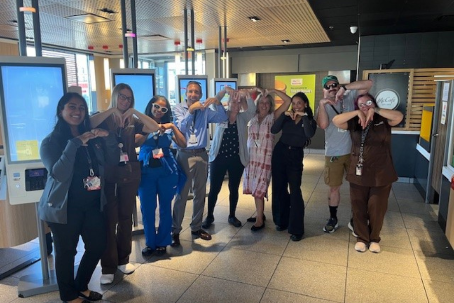 The Episcopal Punishers (including Abraham, far left) completing the fast food challenge.