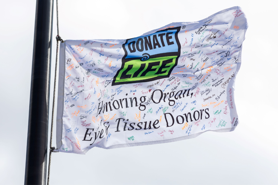 A Gift of Life flag-raising ceremony honoring an organ donor at Temple Health. 