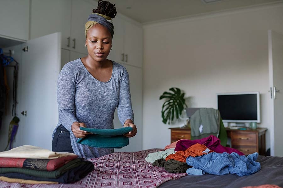 Woman folding laundry
