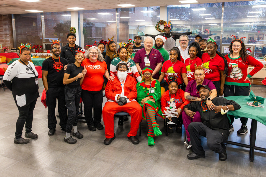 The TUH-Episcopal Campus team embraced the holiday spirit by dressing as Santa, wearing elf costumes, and donning Grinch sweaters—and more!