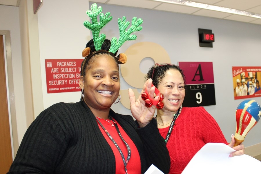 Patient Experience Coordinator Tonita Brown (left) is always one of our most enthusiastic carolers!