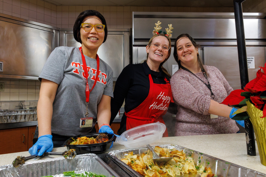 Sparkly reindeer antlers made serving the Temple Women & Families Campus holiday meal extra fun!