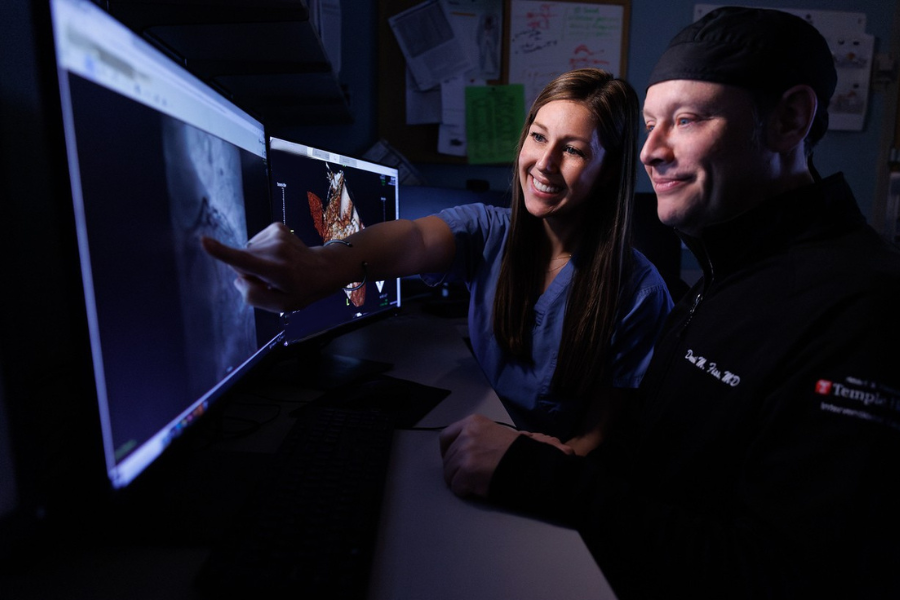 Pietrolungo and Dr. Fiss examine a cardiac CT