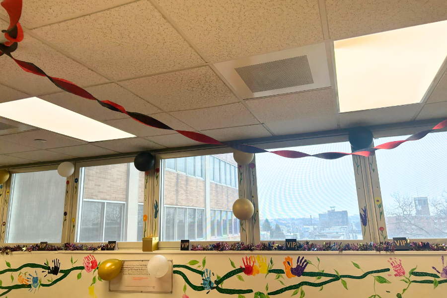 The main wall of the Rec Room, decorated with patient handprints. 