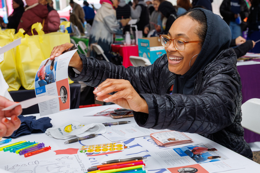 Inside the tent at the April 12th baby shower, team members handed out educational materials and other information.