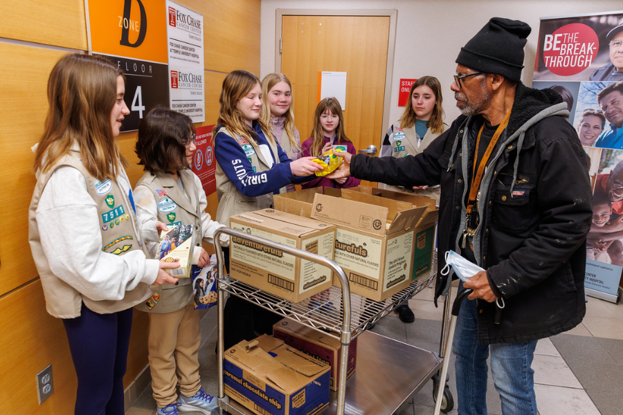 The Girl Scouts handed out their cookies to patients and employees.