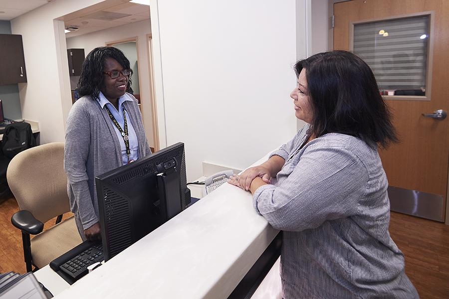 Receptionist helps patient