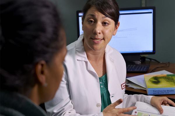 Dr. Sharon Herring with a patient