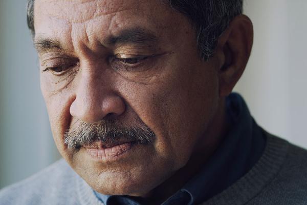 Older man looking concerned