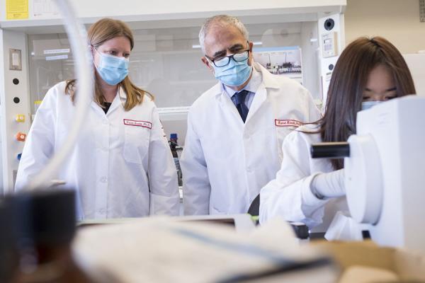 Kamel Khalili and Tricia Burdo in the research lab