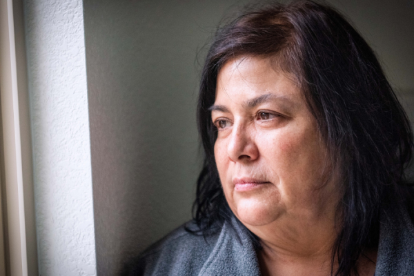 Woman looking out the window