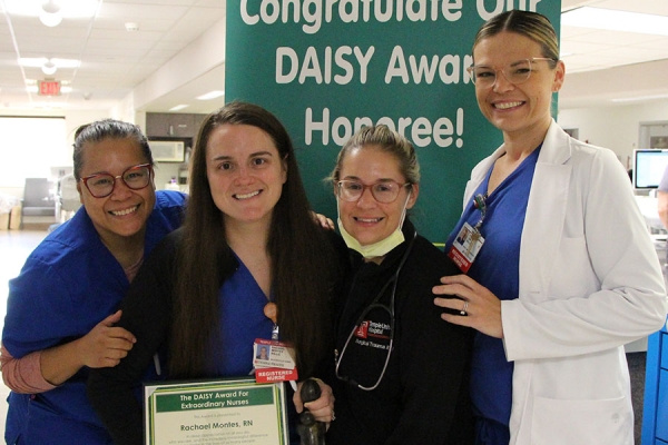 Rachel Montes with colleagues 900x600