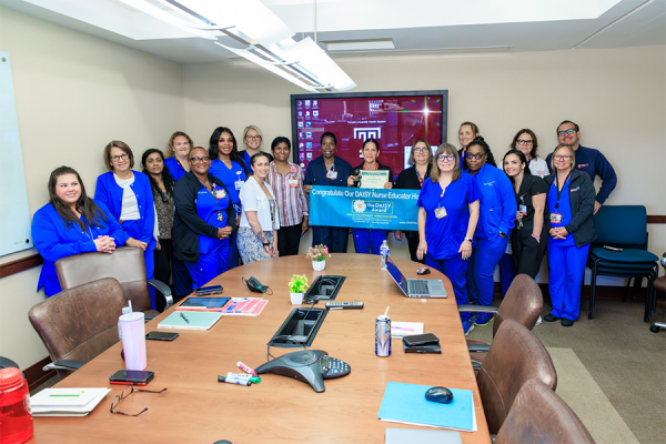 Tina Klein with her coworkers