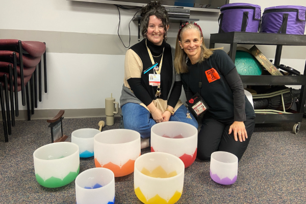 Behavioral Health Therapists Lindsy Burns (left) and Alicia Brodersohn (right) before the sound bath meditation session at TUH-Episcopal Campus.