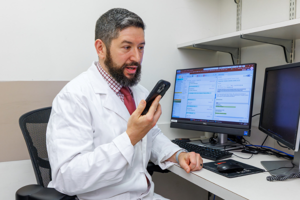 Dr. Slovis articulates his treatment plan after a visit with a patient.