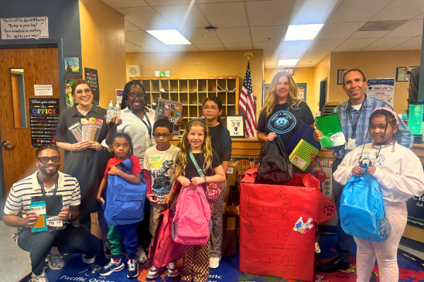 Episcopal team members with students and teachers at Henry A. Brown School.
