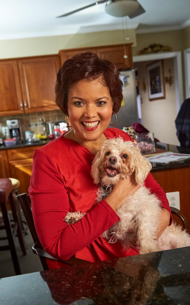 Temple heart transplant patient, Alicia, with her dog.