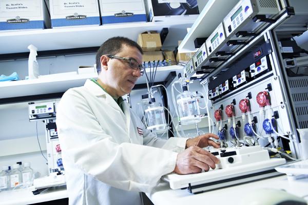 Cardiologist running research machine