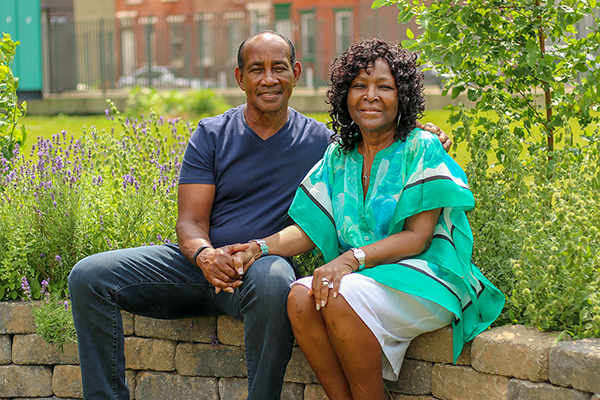 Temple patient, Sharon, in her garden with her husband, Larry